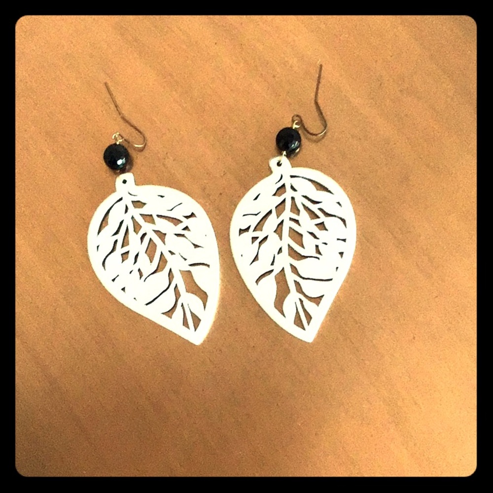 Handmade white wood earrings from Brazil
